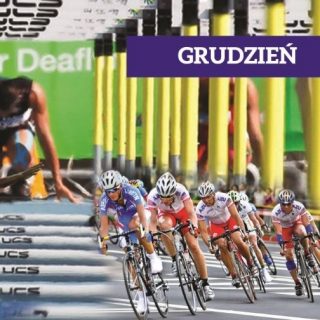 Grafika z napisem grudzień, a na niej grupa kolarzy na rowerach
